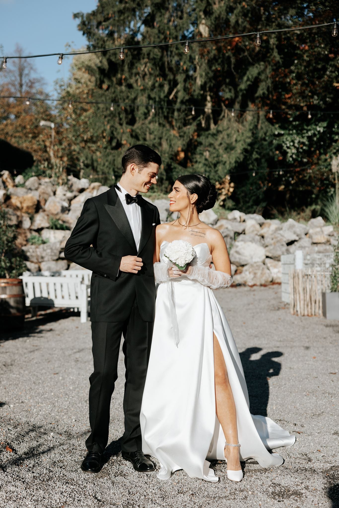 Persian bride and groom in formal attire — autumn destination wedding portrait