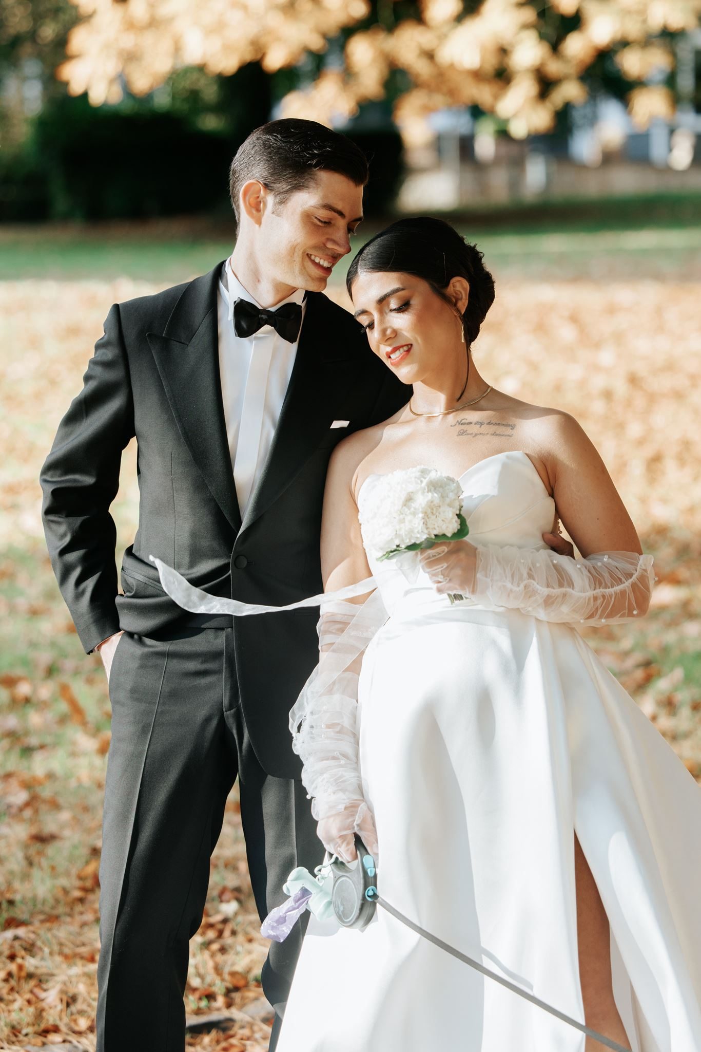 Persian bride and groom holding hands close — intimate destination wedding portrait